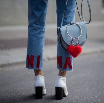 Street Style - Day 1 - Stockholm Fashion week Spring/ Summer 2018 stockholm, sweden august 30 nina sandbech wearing an off shoulder top, denim jeans with nina print outside by malina on august 30, 2017 in stockholm, sweden photo by christian vieriggetty images